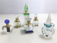 Multicolored glass perfume bottles w/stoppers,