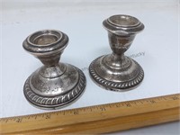 Weighted Sterling candlesticks they don't match