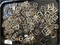 Tray lot of buckles.