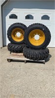 Set of 4 New 10-16.5N.H.S Skid Steer Tires & Rims