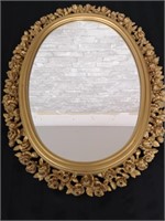 Vintage oval framed mirror.