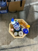 lot of cleaning items and shampoo.