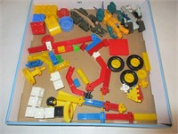 Toy plastic blocks and figures