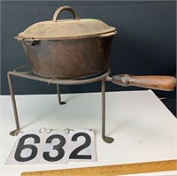 Cast Iron Dutch oven on Metal stand