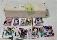 Assorted sports cards, box