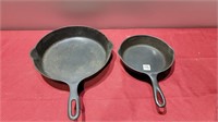 2 early cast iron pans with fire rings