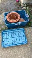 Plastic tote with flower pots