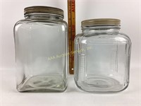 (2) glass canisters metal lids