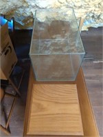 Glass display case with wooden base