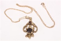 14ct Gold and Garnet Pendant on 10ct Chain,