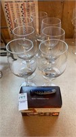 Glass stemware, wine bottle thermometer and