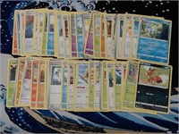 50+ Assorted Pokemon Cards