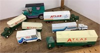 Group of Atlas Van lines toy trucks