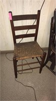 Wooden chair w/ woven seat
