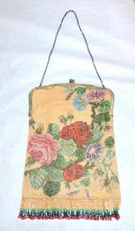 Lady's large beaded purse with floral motif,