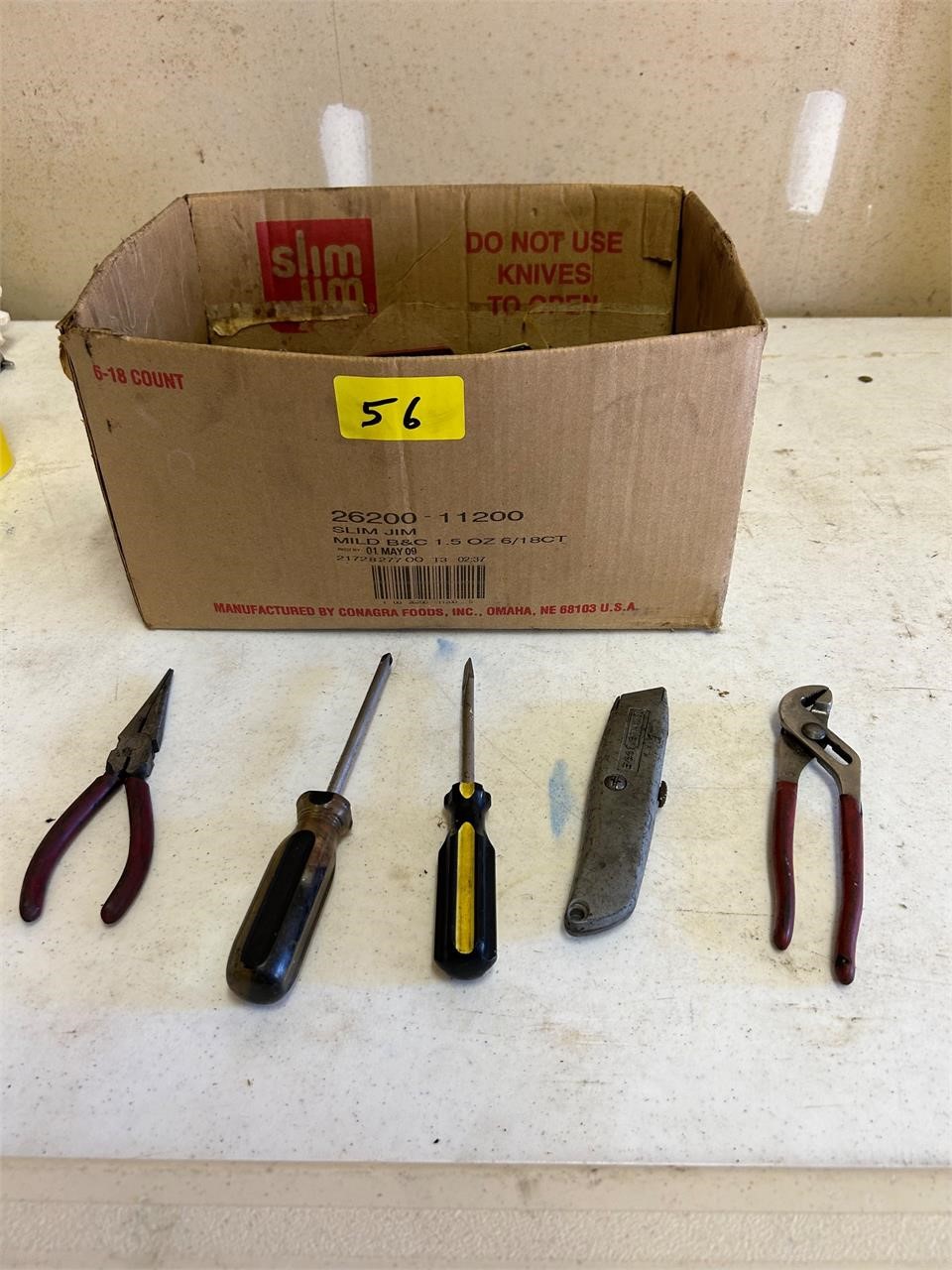 box of assorted handheld tools