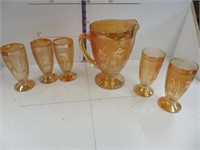 Carnival glass pitcher and 5 glasses