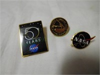 Lot of three original NASA lapel pins from employe