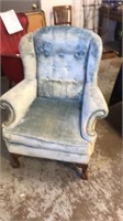 Blue velvet wing chair