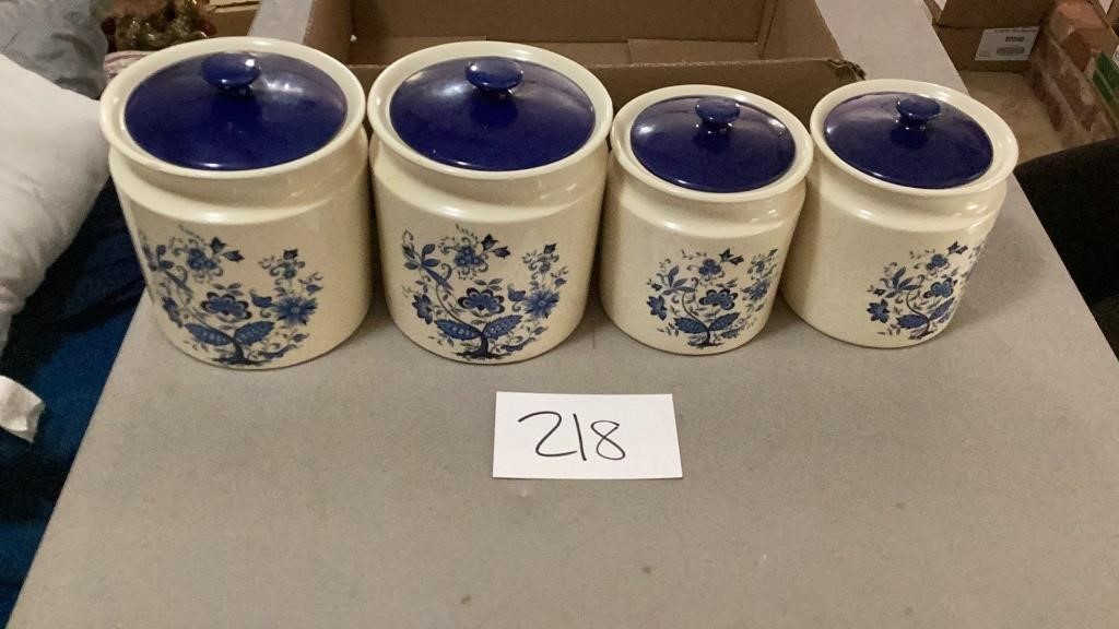 Blue and cream canister set. one canister has a