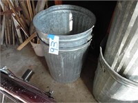 Metal galvanized garbage cans.