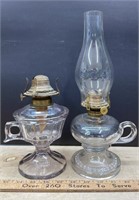 2 Antique footed hand Oil Lamps