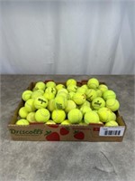 Large assortment of tennis balls