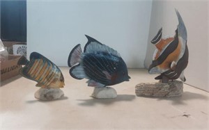 3 Fish sculptures/ Figurines mounted on Coral
