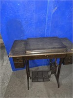 Singer treadle sewing machine believed to have