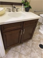 Womens Sink and Cabinet