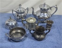 Assorted silver plated serving dishes.