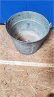 Bucket is 10 3/4 in wide and 9 in tall