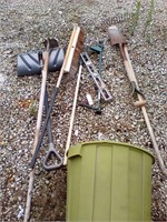 Assorted hand tools in bin