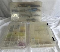Three tackle containers and their contents