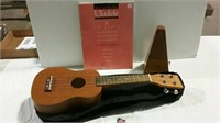 Ukulele with case,metronome and book