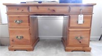 Lot #2142 - Pine seven drawer knee hole desk