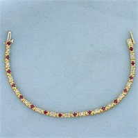 2.5ct TW Ruby and Diamond Tennis Bracelet in 14K Y