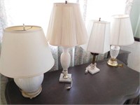 Four lamps to include: white cased glass font