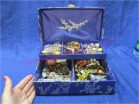 costume jewelry in blue jewelry box