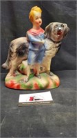 Chalkware boy with large dog figure