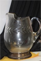 An English Sterling Rim and Cut Glass Pitcher