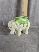 GREEN AND WHITE CERAMIC ELEPHANT HOLDER