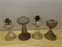 Antique glass oil lamps.