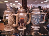 Six Avon lidded beer steins, all with figural