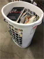 Book Assortment In Laundry Basket