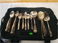 Lot of silver plate utensils with a bag