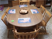 Oak round table w/ 6 chairs -lazy susan