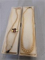 Pair of Antique Pearl Like Lotus Lady Necklaces