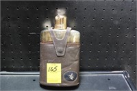 Whiskey Flask with a Leather Cover