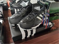 New pair Adidas cleats, size 9
